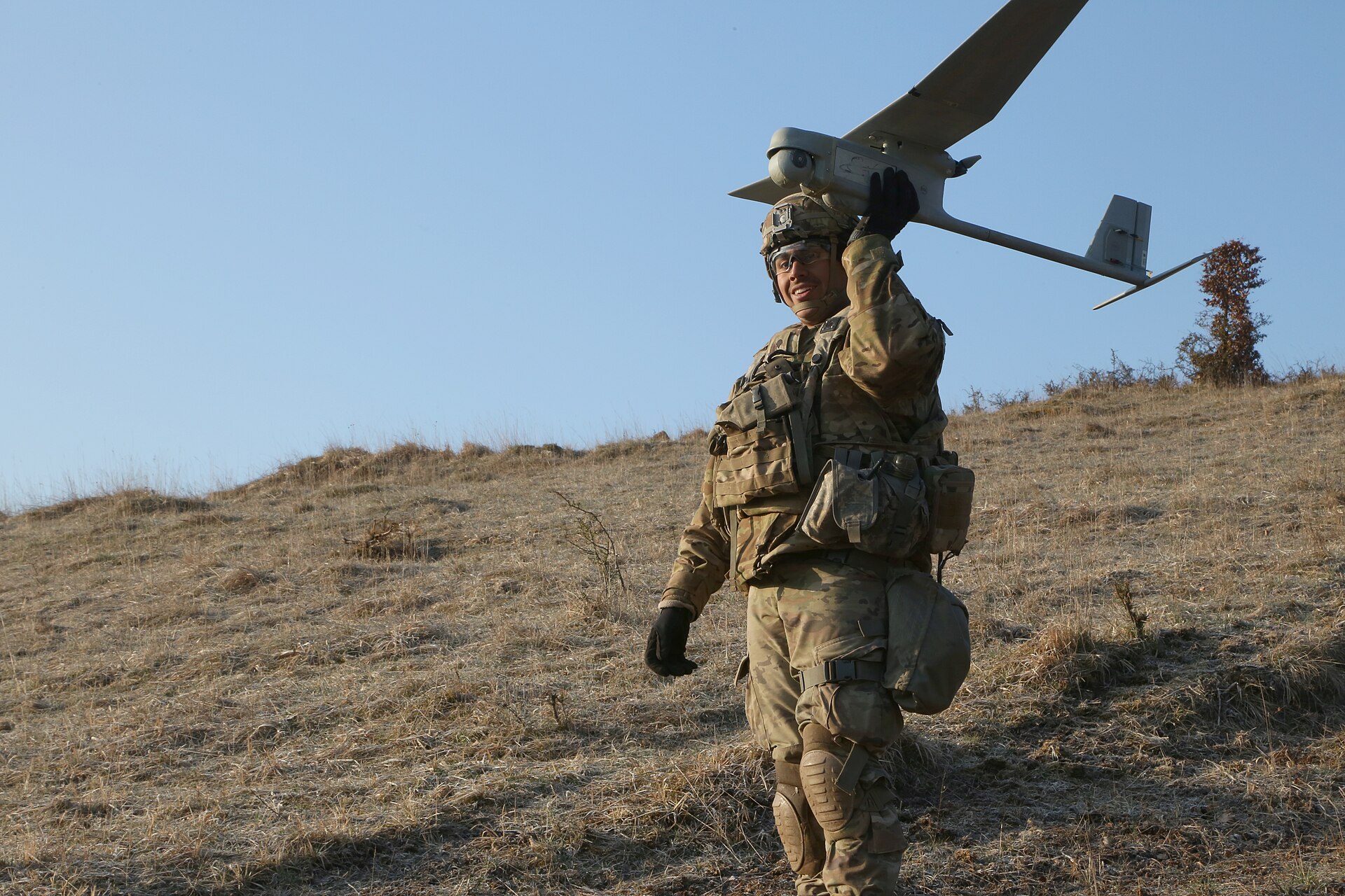 Soldier launching a reconnaissance UAS in the field